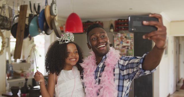 Father and Daughter in Kitchen Taking Selfie During Dress-up Time - Download Free Stock Images Pikwizard.com