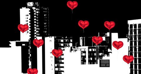 Floating Red Heart Balloons Over City Silhouette at Night