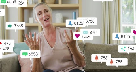 Social media interaction over mature woman in home setting