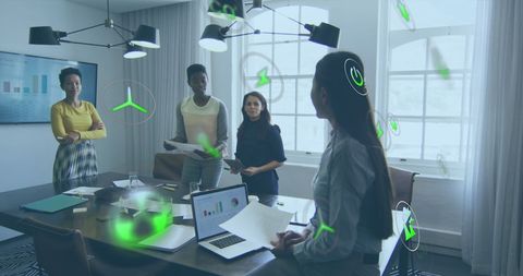 Diverse Businesswomen Collaborating with Digital Technology in Modern Office