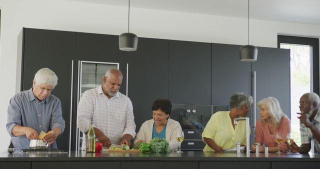 Group of Diverse Friends Cooking and Enjoying Time Together in Modern Kitchen - Download Free Stock Images Pikwizard.com