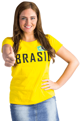 Transparent woman in brazil sportswear giving thumbs up gesture