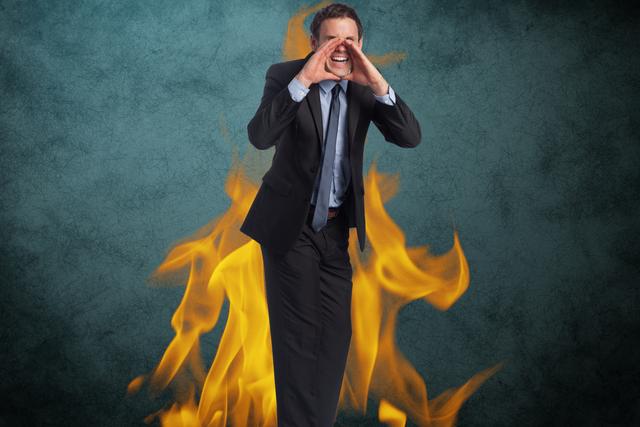 A businessman in a suit shouting with frustration, surrounded by flames. This striking image can be used to depict office stress, burnout, emotional overload, and high-pressure work environments. Ideal for articles on workplace mental health, business challenges, coping with stress, or dramatic advertising visuals.