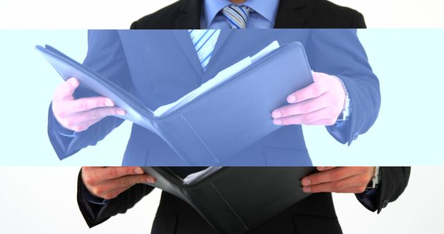 Businessman Reviewing Documents in Suit and Tie - Download Free Stock Images Pikwizard.com