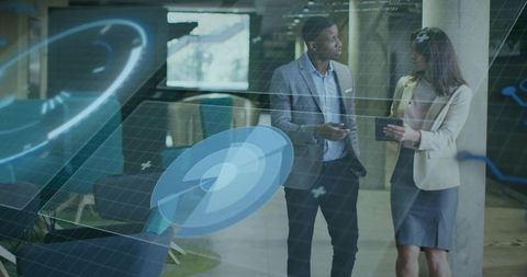 Business Professionals Engaging with Holographic Data Visualizations