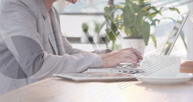 Businesswoman Analyzing Data on Laptop in Open Office - Download Free Stock Images Pikwizard.com