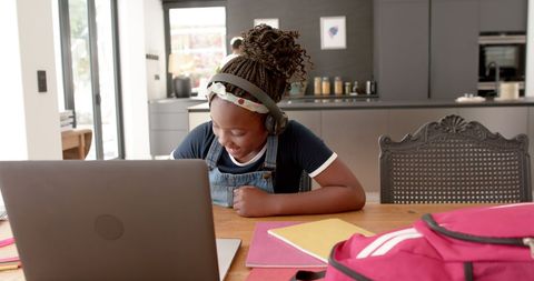 Happy Girl Using Laptop for Online Learning at Home - Download Free Stock Images Pikwizard.com
