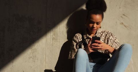 Joyful Woman Using Smartphone in Urban Setting - Download Free Stock Images Pikwizard.com