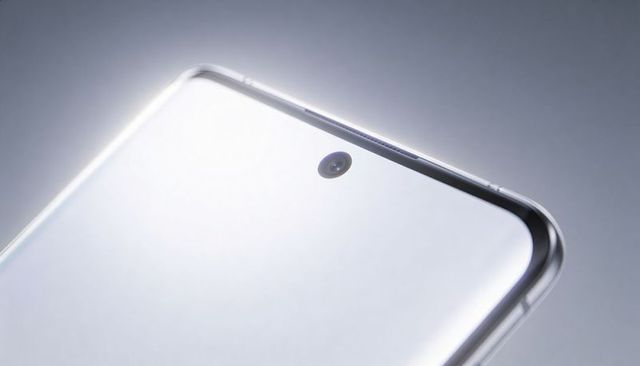 Showcasing glossy white smartphone with centered punch-hole camera and curved metal frame