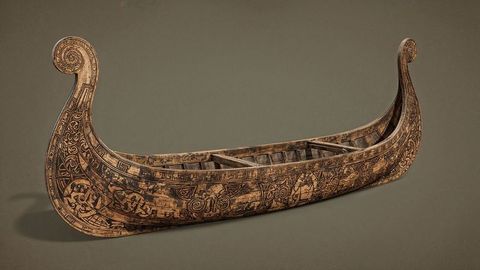 Exquisite antique wooden canoe with intricate carvings