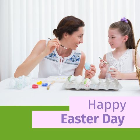 Mother and Daughter Joyfully Decorating Easter Eggs Together