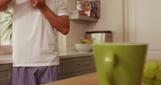 Man Enjoying Morning Coffee in Cozy Kitchen - Download Free Stock Images Pikwizard.com