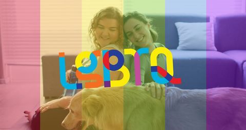 LGBTQ Couple Relaxing with Dog at Home Embracing Rainbow Colors - Download Free Stock Images Pikwizard.com
