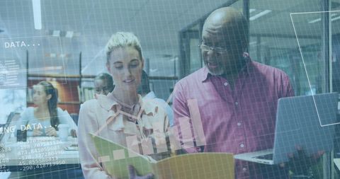 Collaborative Team Analyzing Data Trends and Using Technology - Download Free Stock Images Pikwizard.com