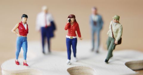 Miniature people illustrating connectivity and communication