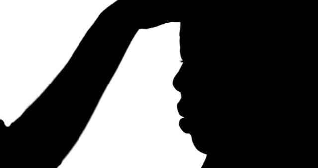 Silhouette of Person Lifting Hand to Another Person's Head - Download Free Stock Images Pikwizard.com