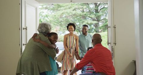 Cheerful Family Reunion at Home Entrance