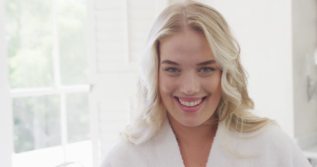 Smiling Woman with Long Blond Hair in Bright Room - Download Free Stock Images Pikwizard.com