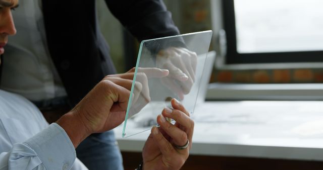 Hands Holding Advanced Transparent Tablet in Modern Office - Download Free Stock Images Pikwizard.com