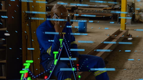 Warehouse Worker Consults Overlaid Stock Data Visualization