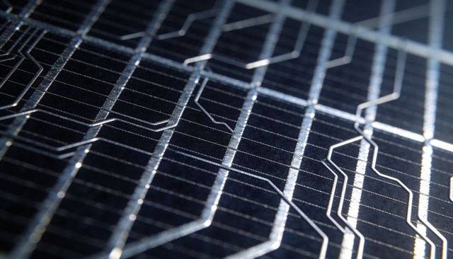 Macro Closeup Photovoltaic Solar Cell Surface Showing Silver Busbars and Textured Coating