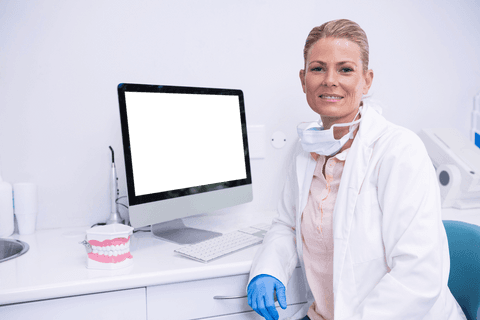 dentist in clinic with computer and dental model on transparent background - Download Free Stock Videos Pikwizard.com