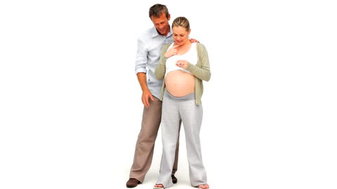 Expecting Couple Embracing Pregnancy Journey Together