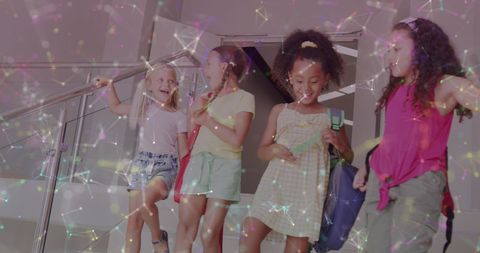 Diverse Schoolgirls Sharing Laughter and Friendship at School