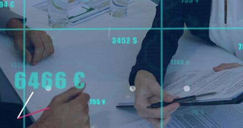 Business professionals reviewing financial reports and signing documents with data overlay