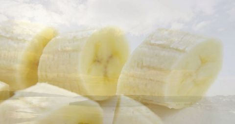 Abstract Banana Slices Overlapping Peaceful Beach