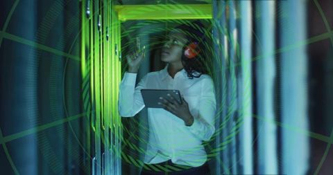 Data Center Technician Inspecting Server Racks in White Blouse and Orange Headset with AR