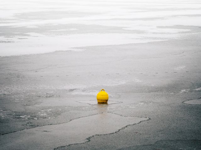 Single Yellow Buoy Floating on Calm, Misty Water - Download Free Stock Photos Pikwizard.com