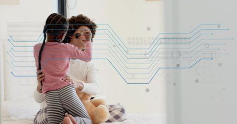 Mother and daughter sharing hug in pajamas with teddy bear and blue circuit overlay