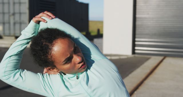 Athletic Woman Stretching Arm Outdoors - Download Free Stock Images Pikwizard.com