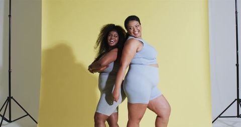 Confident Plus Size Women in Activewear Celebrating Fitness