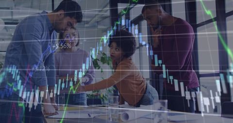 Team analyzing financial growth trends in office setting