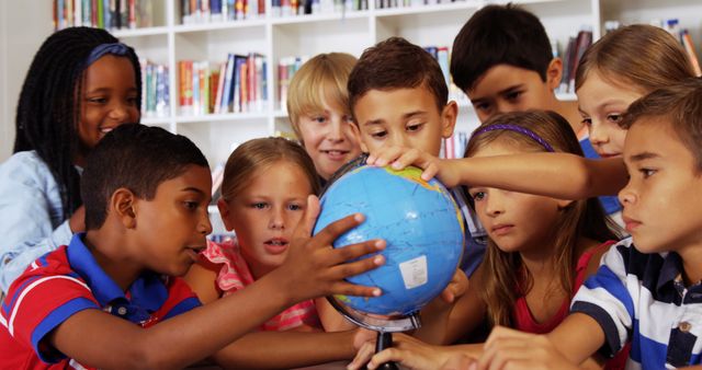 Curious and Diverse Students Exploring Globe in Classroom - Download Free Stock Images Pikwizard.com