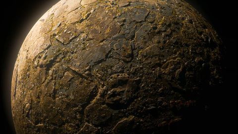 Rotating rocky planet revealing cracked crust and green mineral veins from orbital view