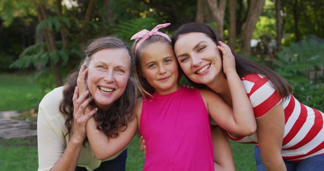 Three Generations of Women Smiling and Embracing Outdoors - Download Free Stock Images Pikwizard.com