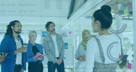Diverse Team Brainstorming in a Modern Office Setting