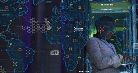 It professional analyzing global cybersecurity data in data center