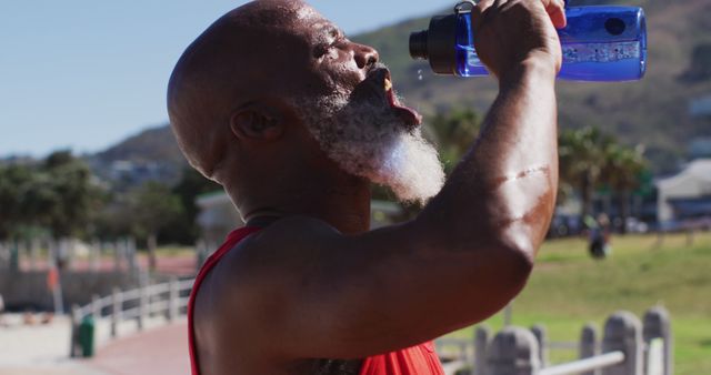 Senior Man Drinking Water During Outdoor Workout - Download Free Stock Images Pikwizard.com