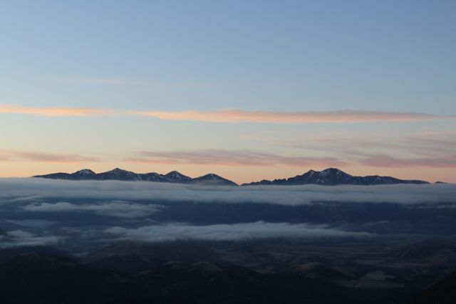 Mountain Range at Dawn with Cloud Veil - Download Free Stock Photos Pikwizard.com