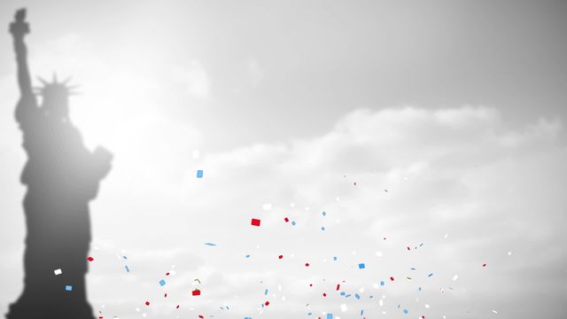 This video depicts red, white, and blue confetti falling against a cloudy sky with the silhouette of the Statue of Liberty in the background. It evokes themes of American patriotism, Independence Day, and celebratory events. Ideal for use in designs related to American holidays, patriotism, festive announcements, or promotional materials.