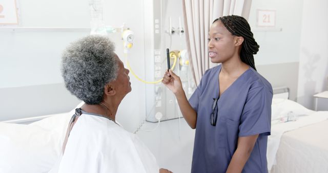 Healthcare Professional Meeting with Senior Patient in Hospital Room - Download Free Stock Images Pikwizard.com