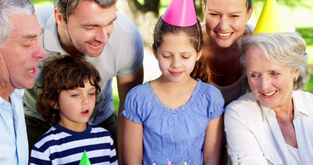 Multi-Generational Family Celebrating Birthday Outdoors - Download Free Stock Images Pikwizard.com