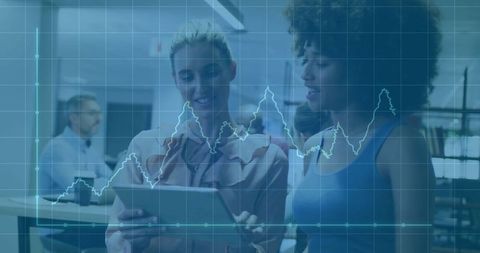 Colleagues Analyzing Data, Technology in Modern Office Collaboration