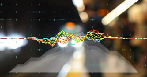 Colorful data spectrum overlay on urban night scene