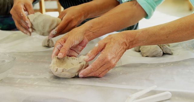 Adults Shaping Clay Art in Creative Pottery Workshop - Download Free Stock Images Pikwizard.com