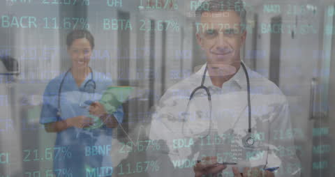 Smiling Healthcare Professionals Amidst Digital Shares Display